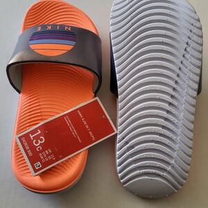 Nike Orange and Black Kids' Slide Sandals with Purple Accent